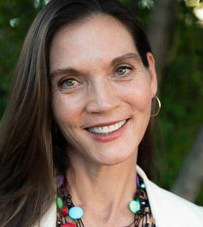 Headshot of Nicole Capdarest-Arest