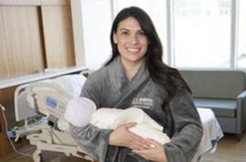 mom holding baby uc davis health lactation support