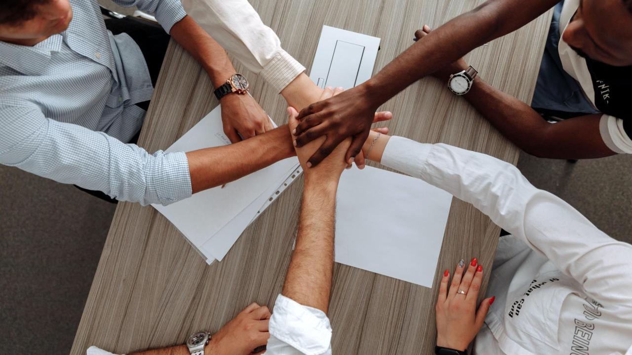 People joining hands